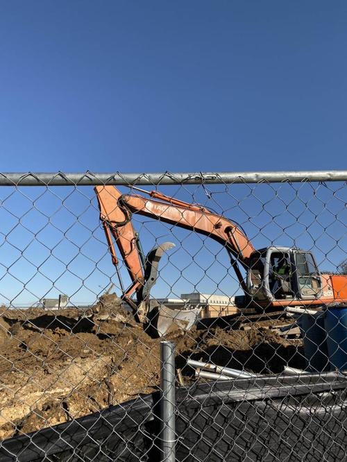 Excavator working a site