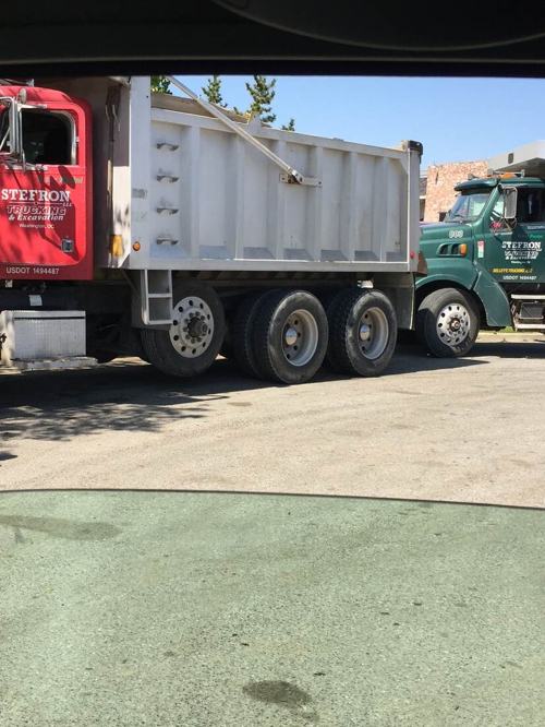 Stefron LLC dump trucks on site